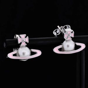 Vivienne Westwood Gold & Pink Saturn Earrings